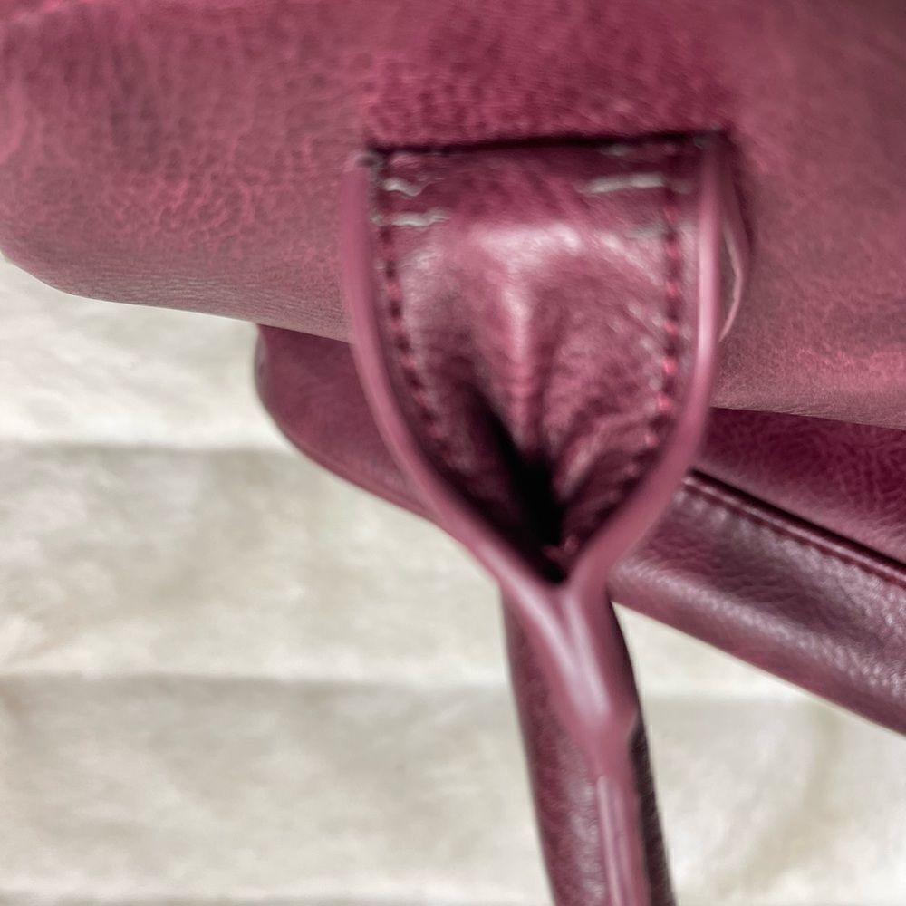 Steve Madden burgundy faux leather satchel with rustic studs accent. - Picture 15 of 16
